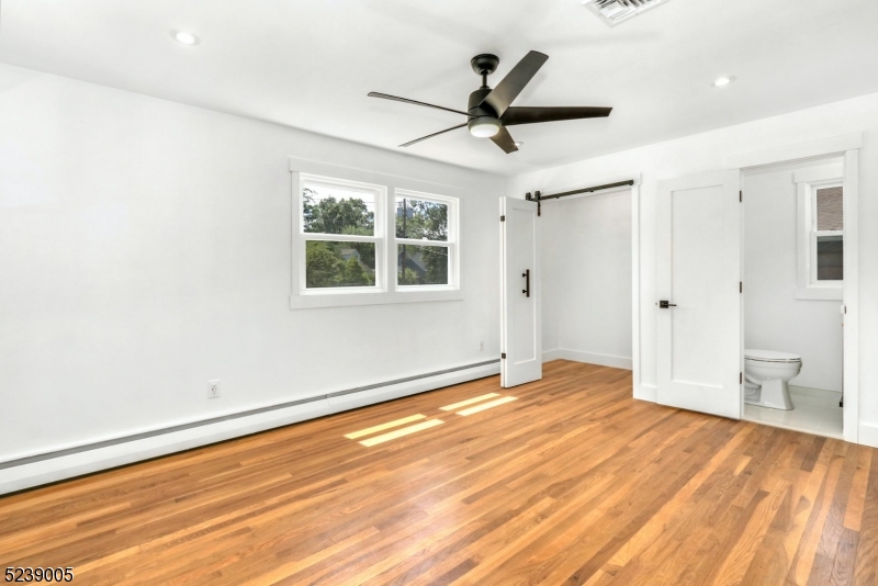 22 Morningside Road Woodbridge, NJ 07067 - Photo 21 of 27 a view of empty room with wooden floor and window