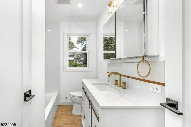 22 Morningside Road Woodbridge, NJ 07067 - Photo 25 of 27 a bathroom with a sink toilet and shower