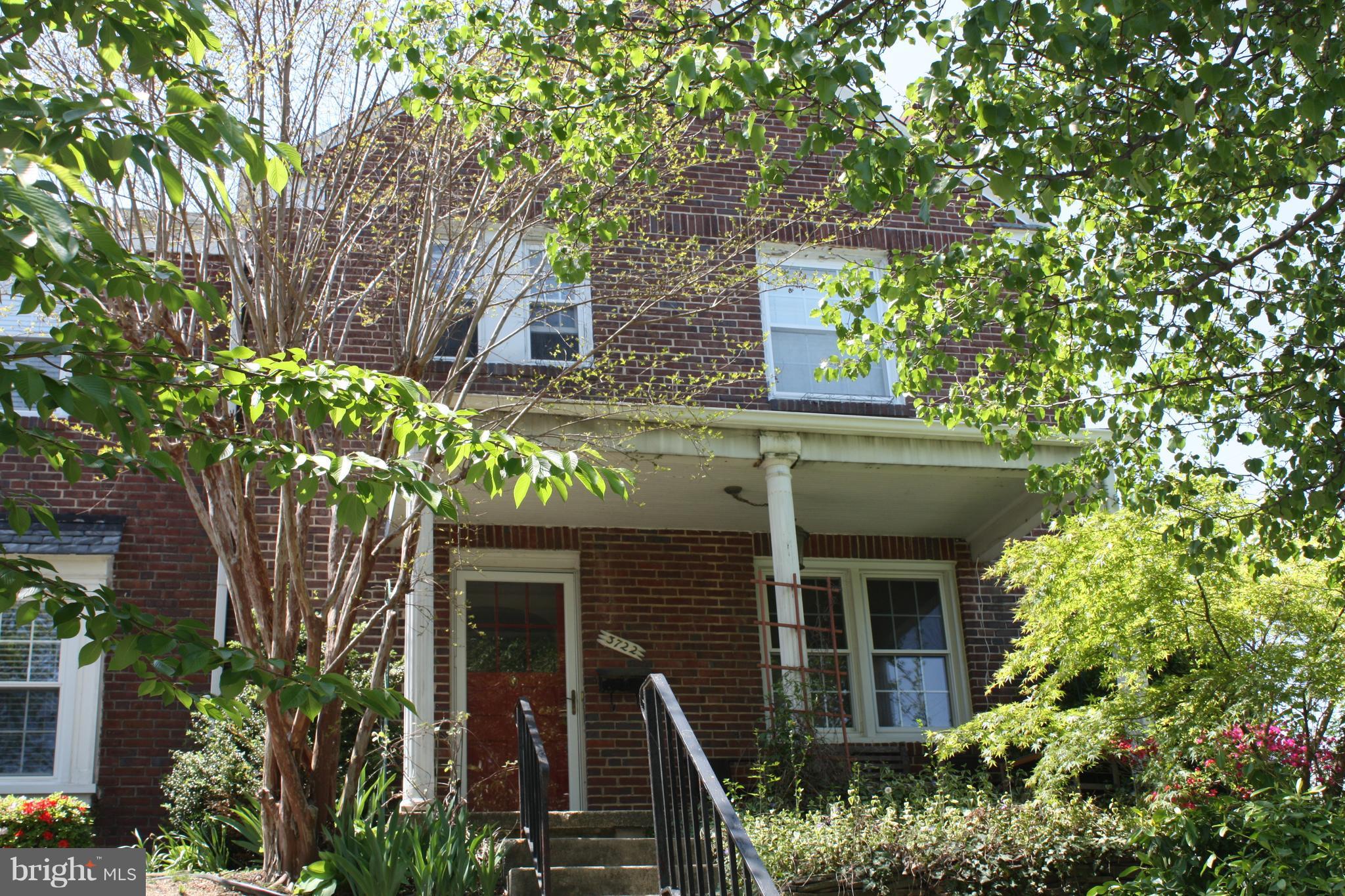 3722 Delverne Road Baltimore, MD 21218 - Photo 1 of 29 front view of a house with a tree