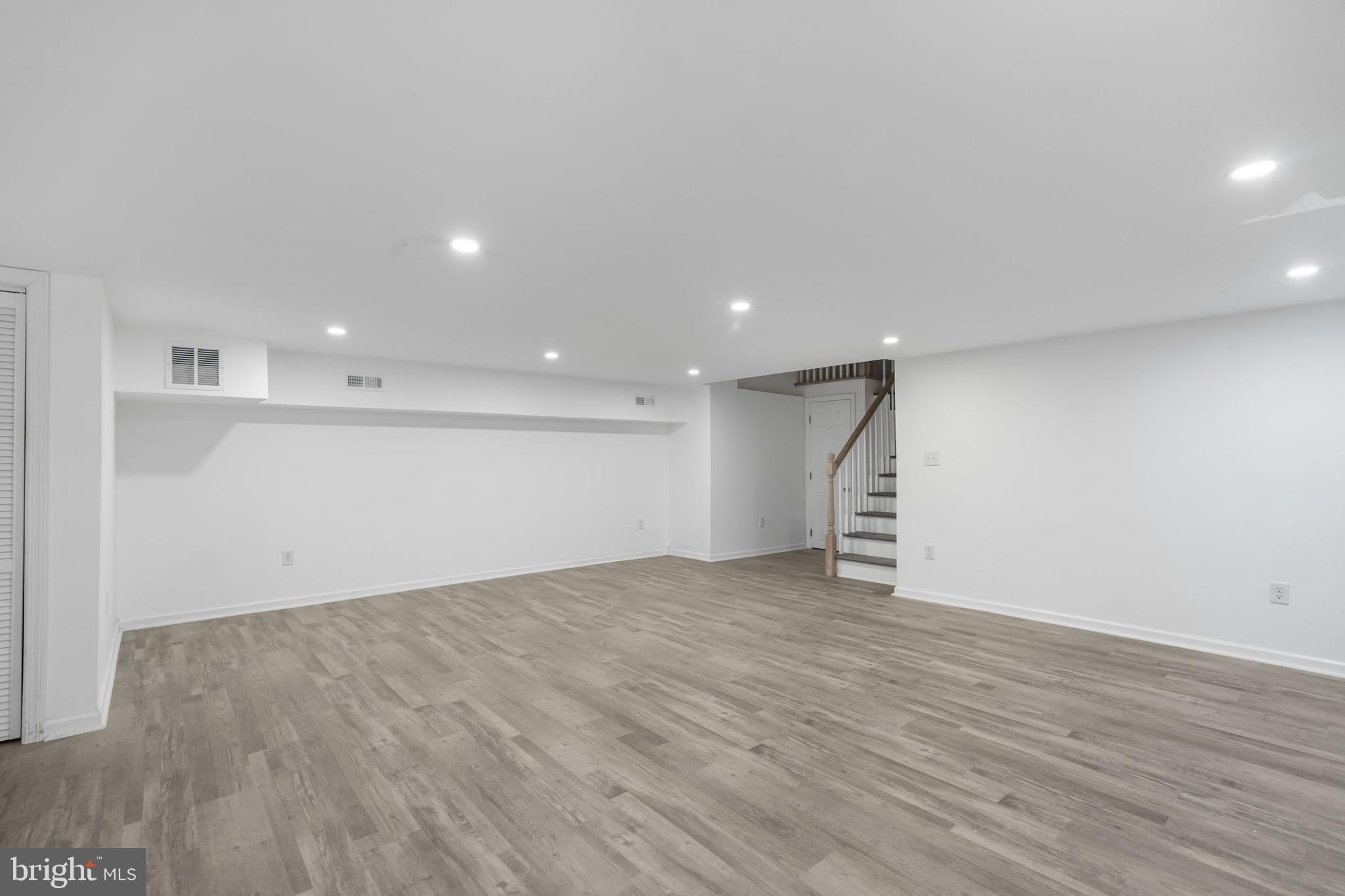 840 Jarvis Road Sicklerville, NJ 08081 - Photo 19 of 25 a view of an empty room with wooden floor