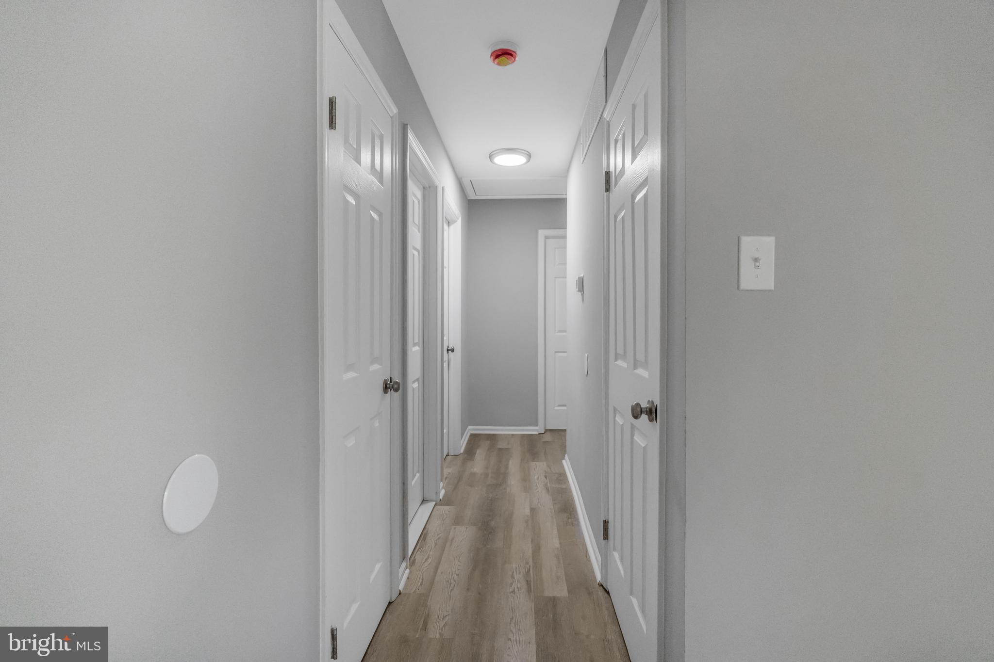 840 Jarvis Road Sicklerville, NJ 08081 - Photo 5 of 25 a view of a hallway with wooden floor