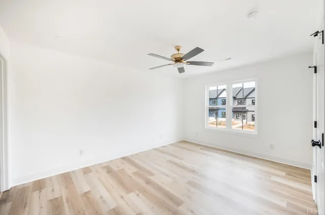a bathroom with a sink vanity granite tub shower and a mirror