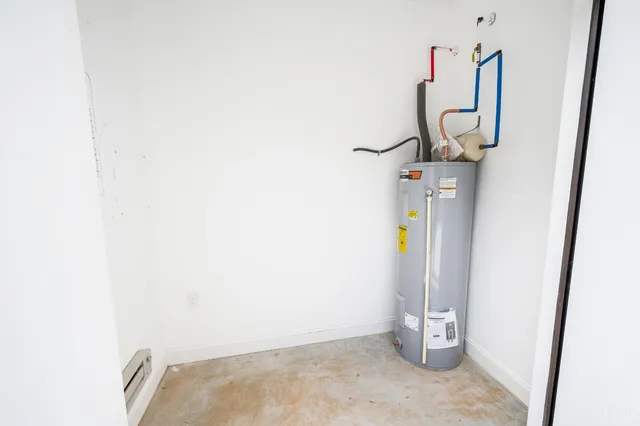 a view of a two chairs in a backyard