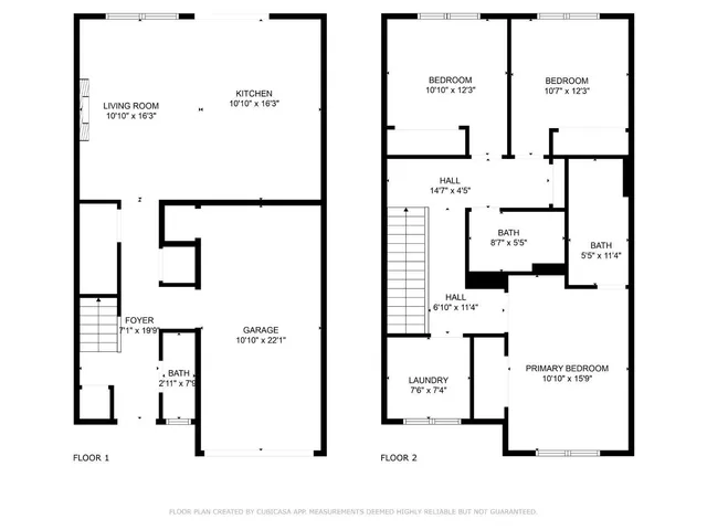 an aerial view of a house with a yard and lake view