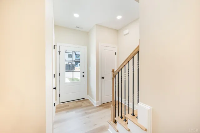 a view of a hallway with entryway