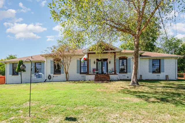 a front view of house with yard