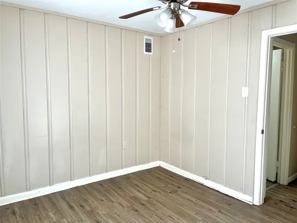 a view of a livingroom with wooden floor