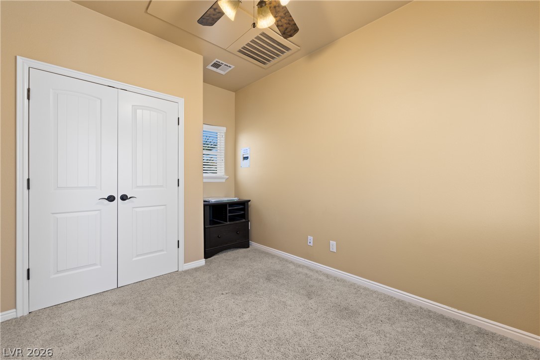 575 Gann Avenue Logandale, NV 89021 - Photo 51 of 75 Casita: A well-lit bedroom offering a cozy retreat with ample closet space.