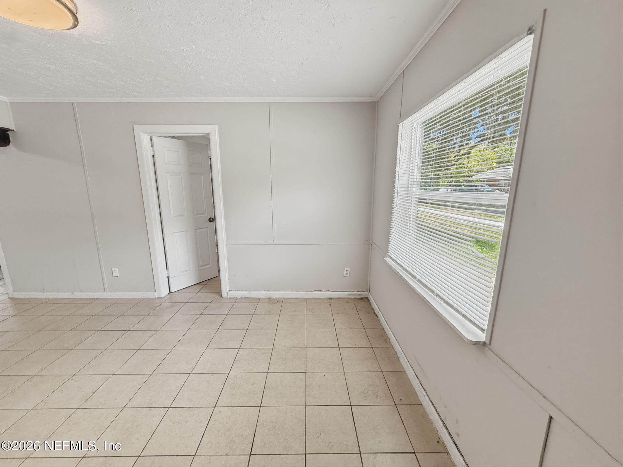 326 Cahoon Road South Jacksonville, FL 32220 - Photo 15 of 34 a view of an empty room and window