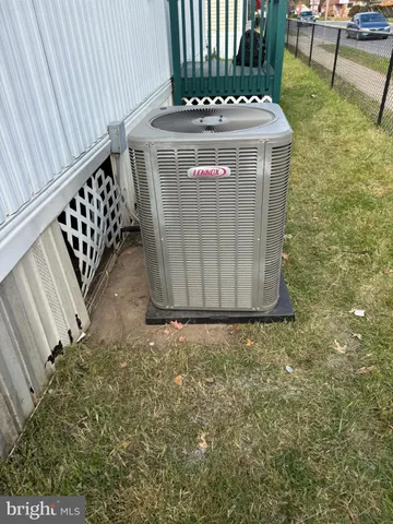 a stove top oven sitting inside of a kitchen