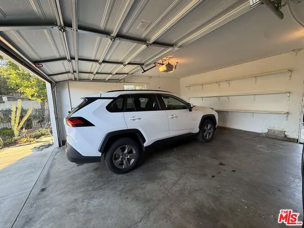 a view of a car in garage