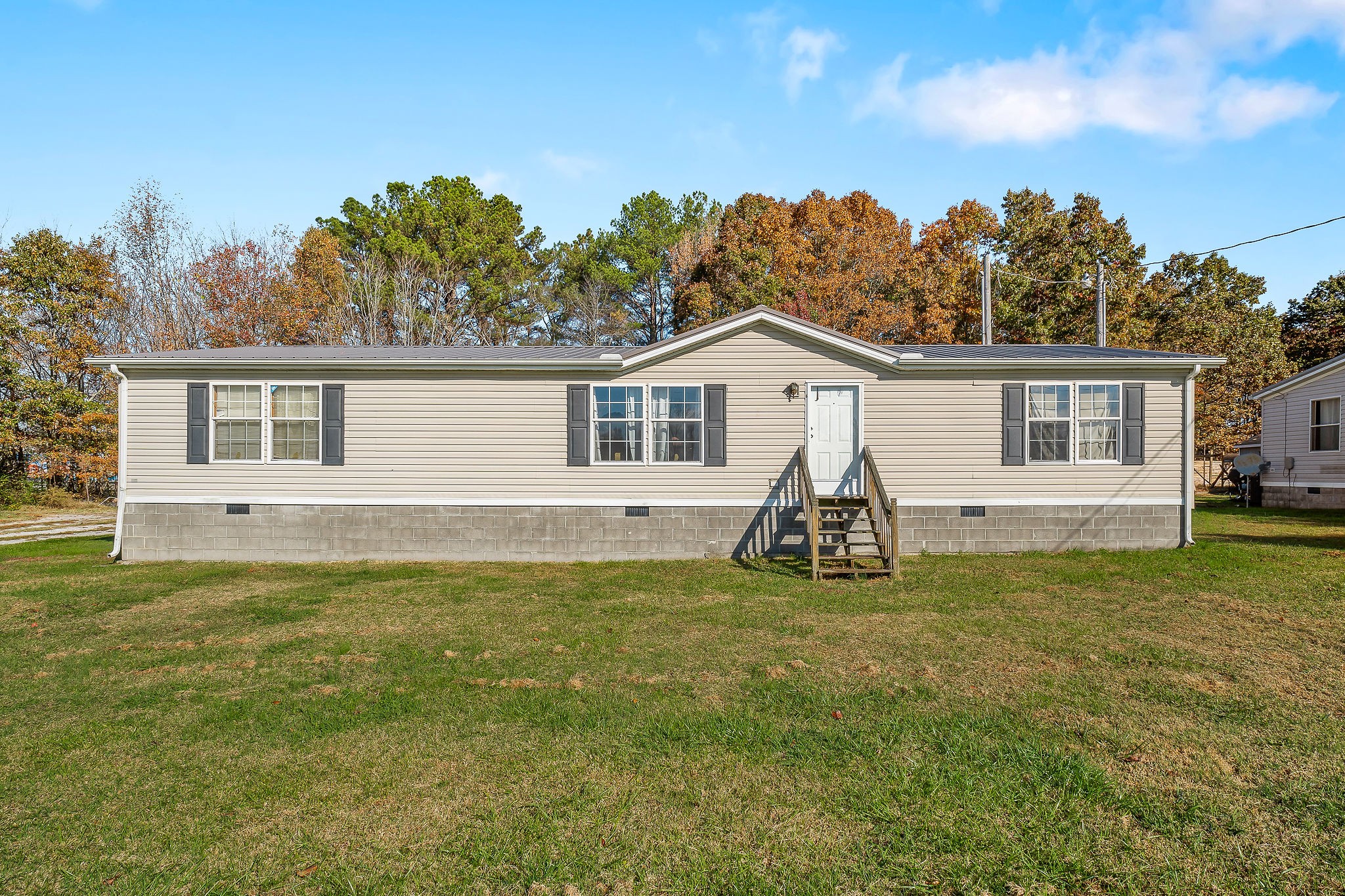 2265 Elmore Town Road Baxter, TN 38544 - Photo 1 of 34 a view of a house with a backyard