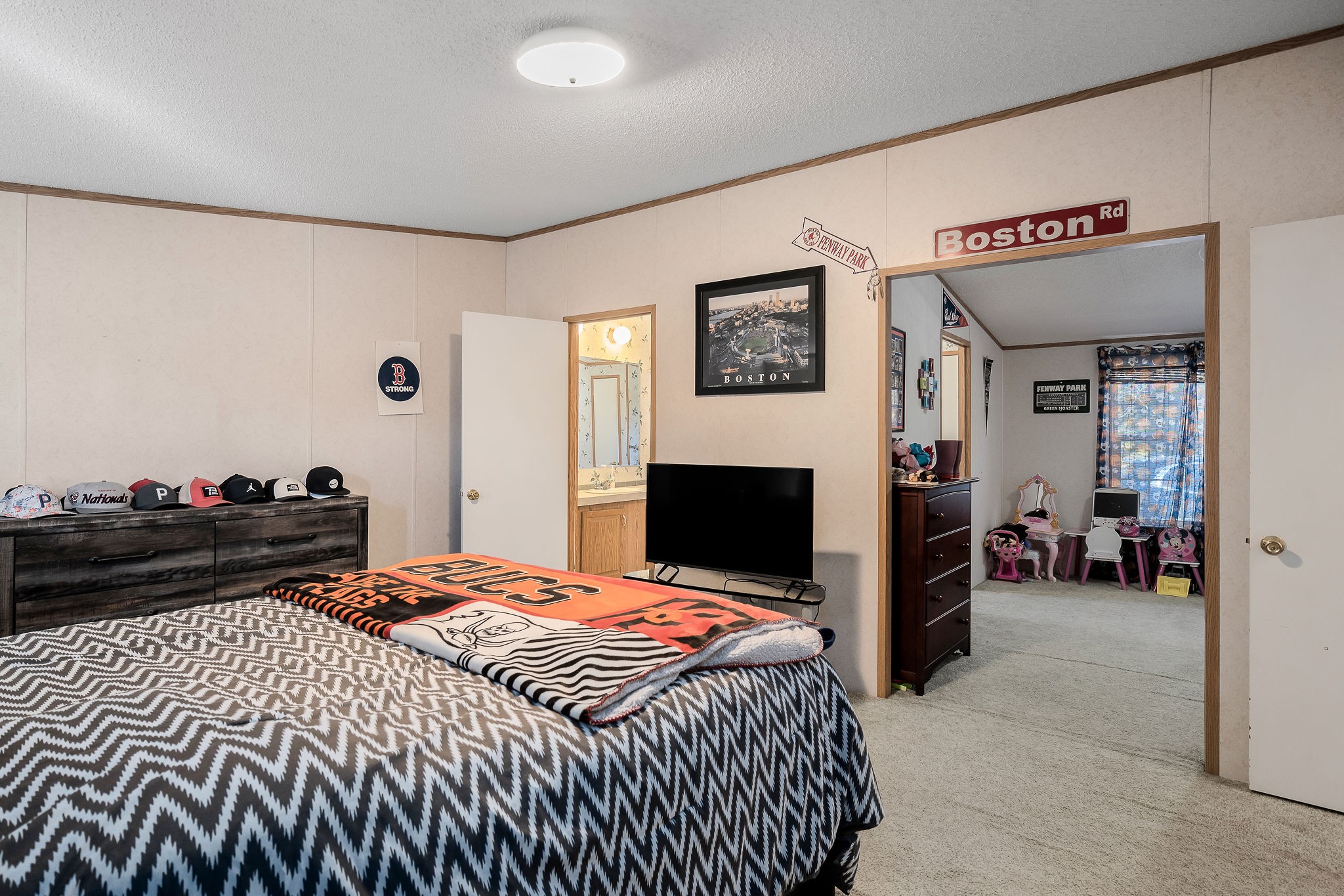 2265 Elmore Town Road Baxter, TN 38544 - Photo 15 of 34 a bedroom with a bed and a lamp
