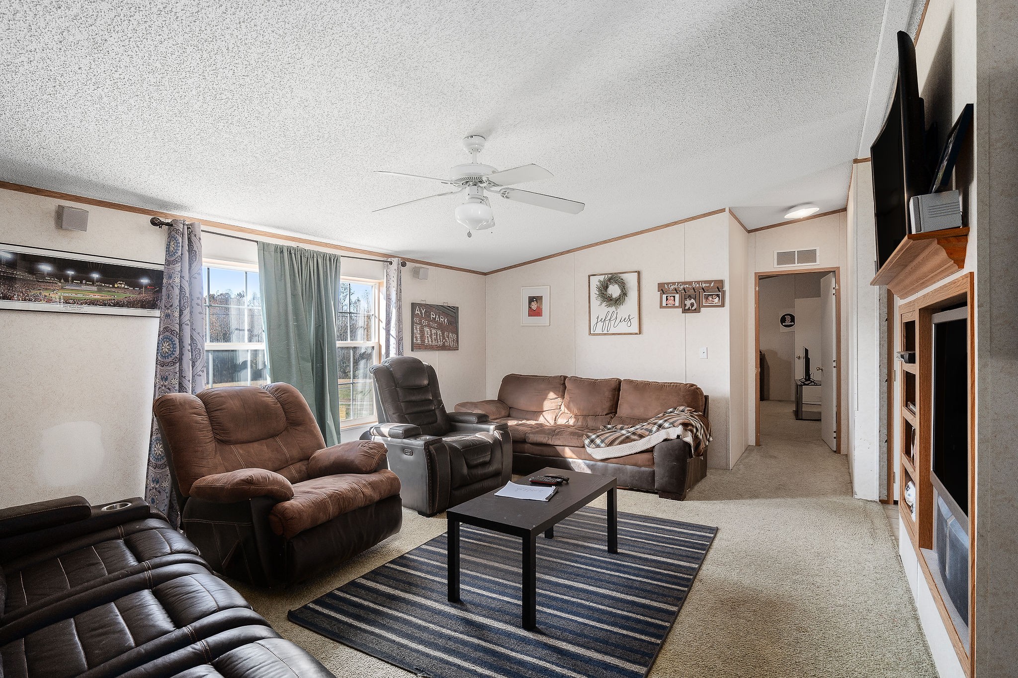 2265 Elmore Town Road Baxter, TN 38544 - Photo 5 of 34 a living room with furniture ceiling fan and a window