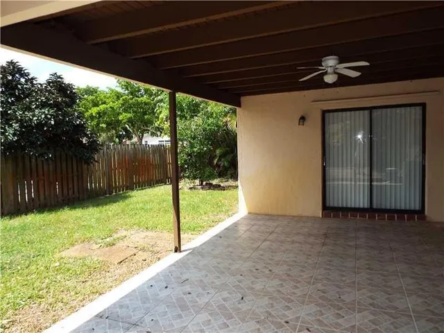 a view of backyard with green space