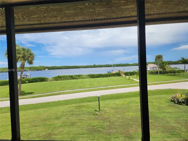a view of a golf course with a lake