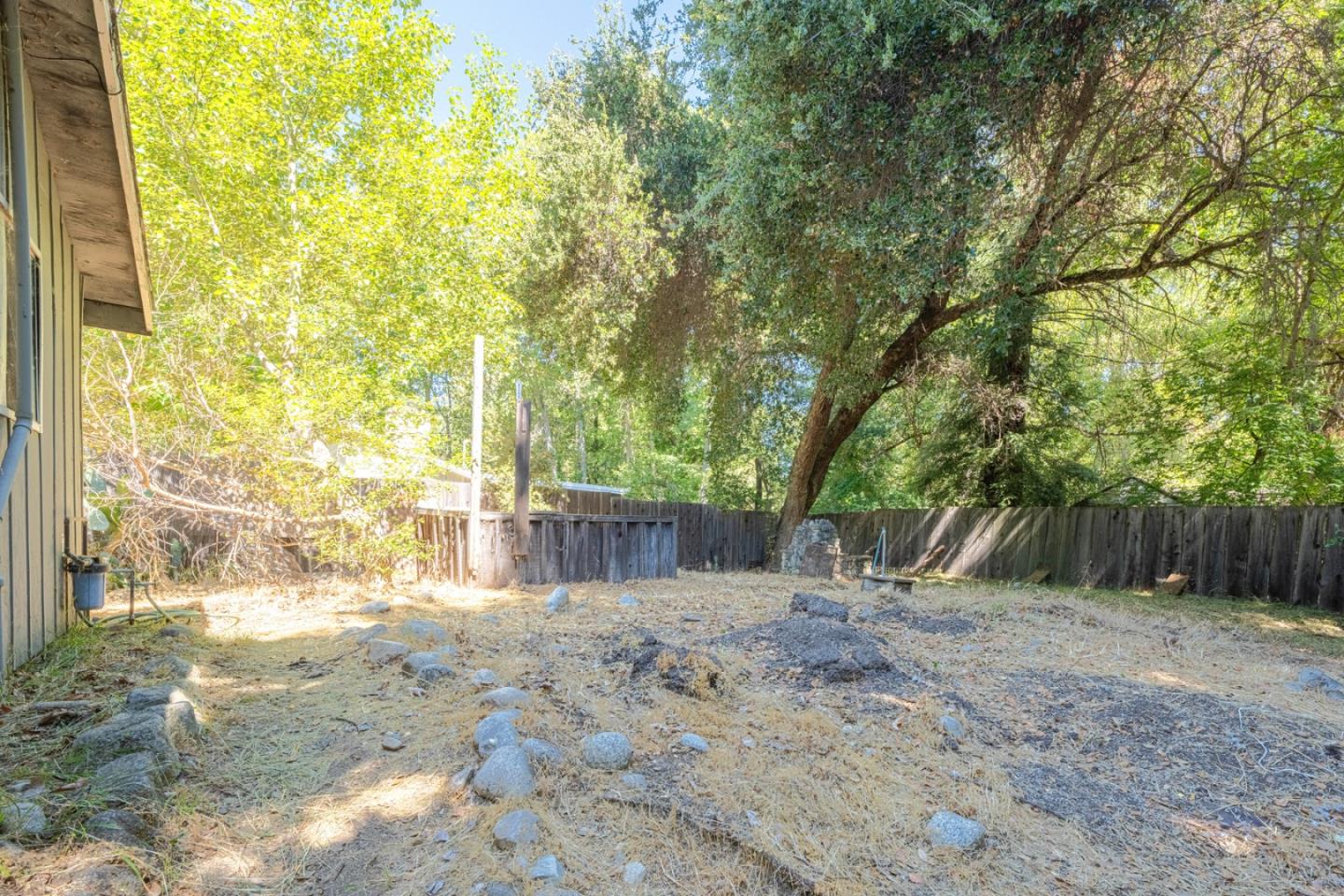 37151 Nason Road Carmel Valley, CA 93924 - Photo 19 of 22 a view of backyard with trees