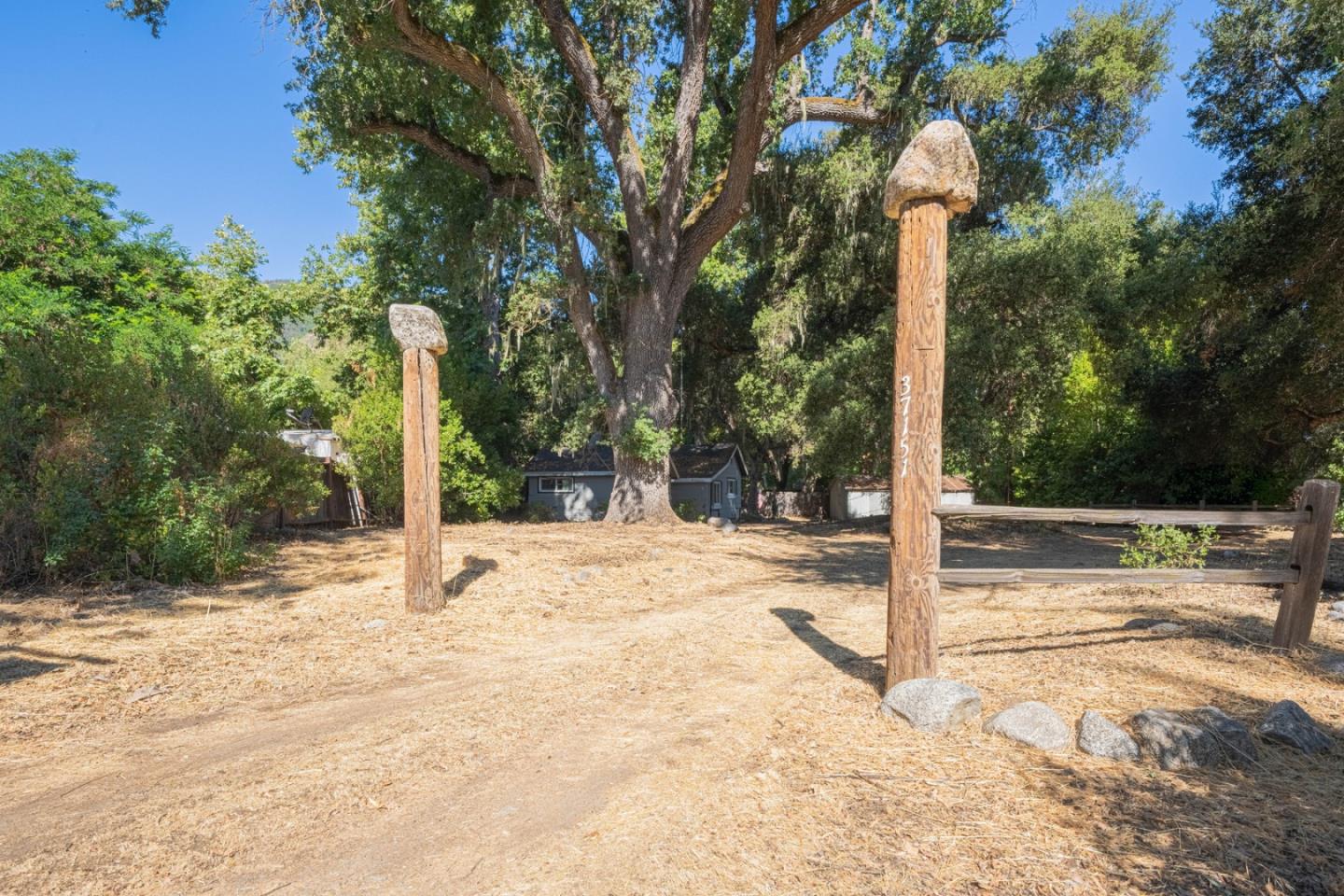 37151 Nason Road Carmel Valley, CA 93924 - Photo 21 of 22 a house with trees in the background