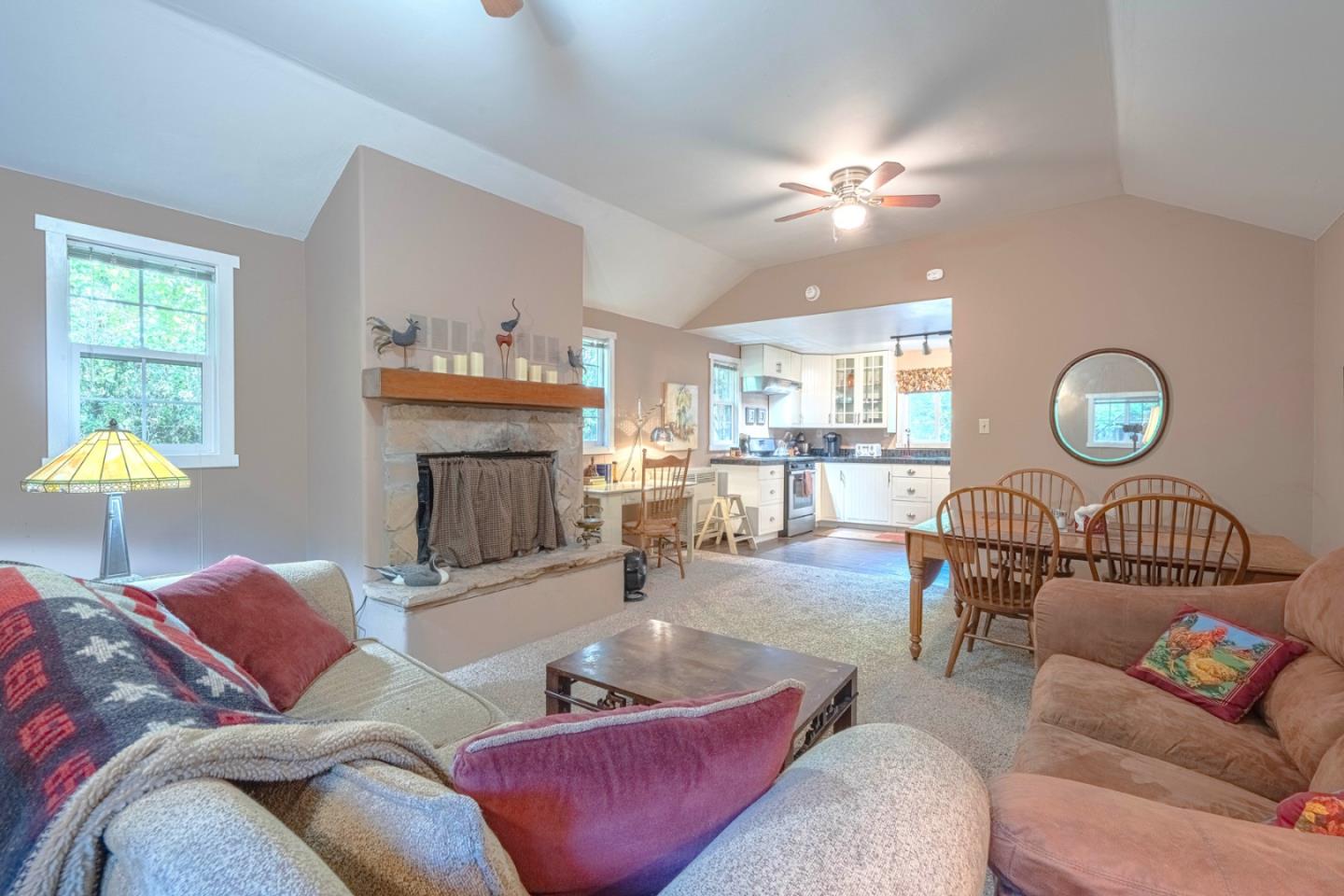 37151 Nason Road Carmel Valley, CA 93924 - Photo 6 of 22 a living room with furniture and a fireplace