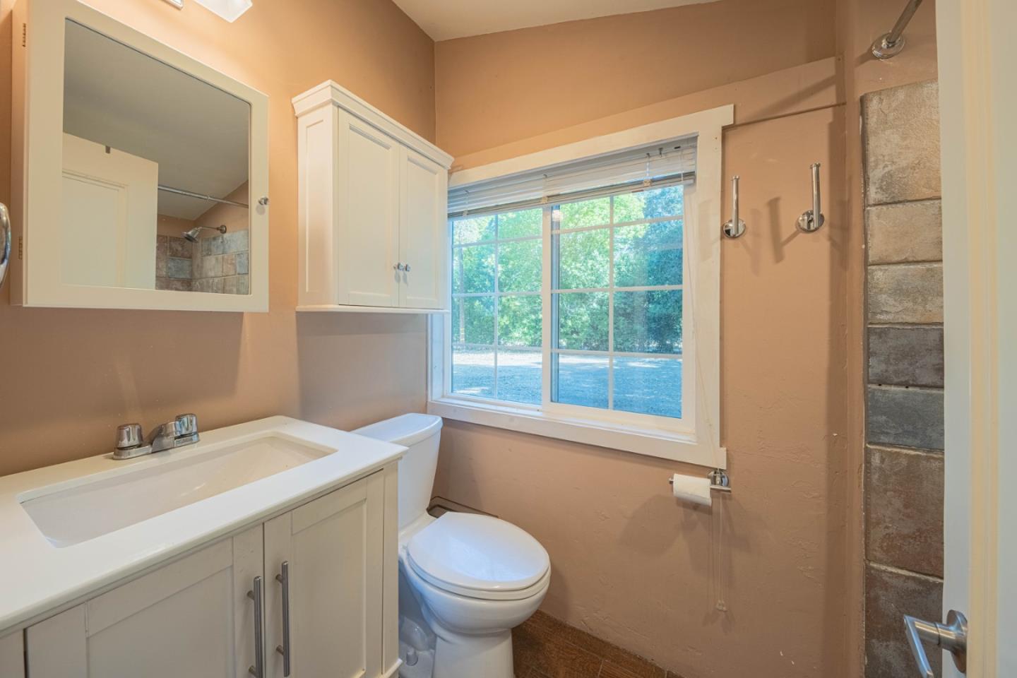 37151 Nason Road Carmel Valley, CA 93924 - Photo 8 of 22 a bathroom with a sink toilet and shower
