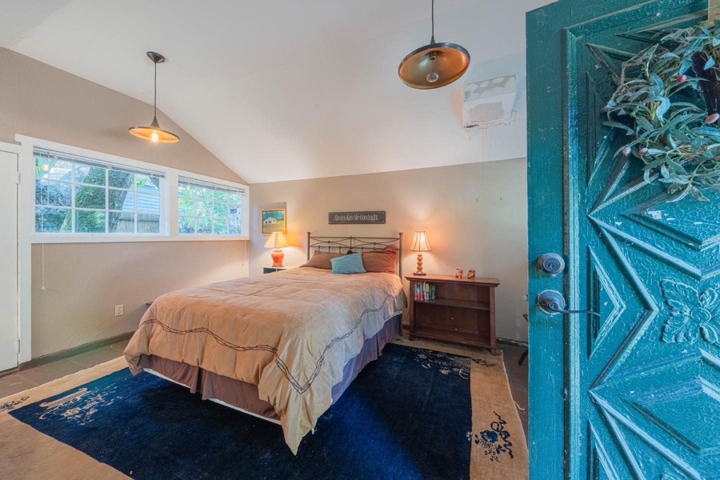 37151 Nason Road Carmel Valley, CA 93924 - Photo 10 of 22 a bedroom with a bed and window