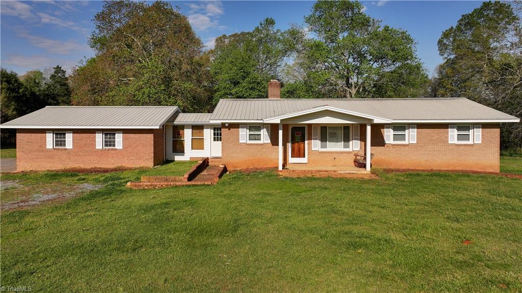 1917 Garner Road Denton, NC 27239 - Photo 2 of 41 Breezewat from carport to hoe