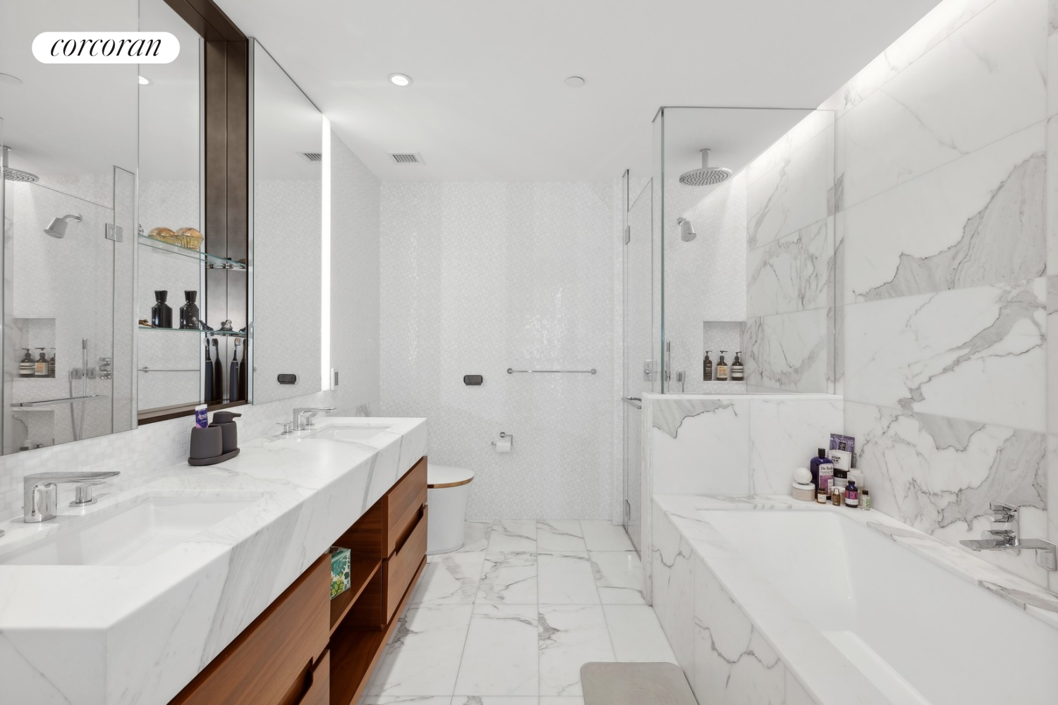 30 Riverside Boulevard, Unit 28C Manhattan, NY 10069 - Photo 6 of 10 a bathroom with a tub sink and mirror