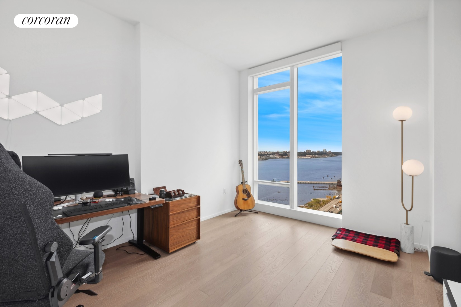 30 Riverside Boulevard, Unit 28C Manhattan, NY 10069 - Photo 7 of 10 a view of a workspace with furniture and a window