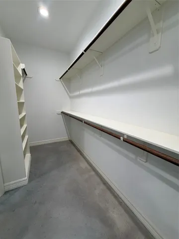 a view of an empty walk in closet