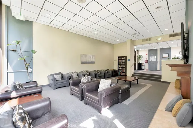 a view of a building with a bench in front of building