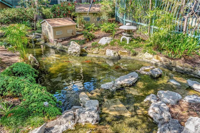 a living room with fireplace furniture and a flat screen tv