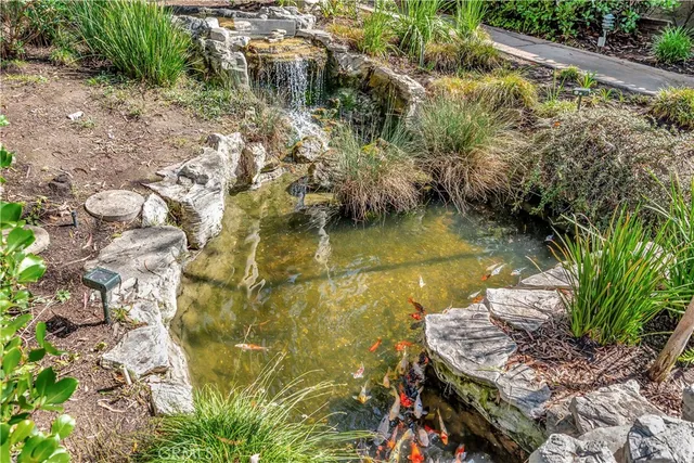 front view of a house with a garden
