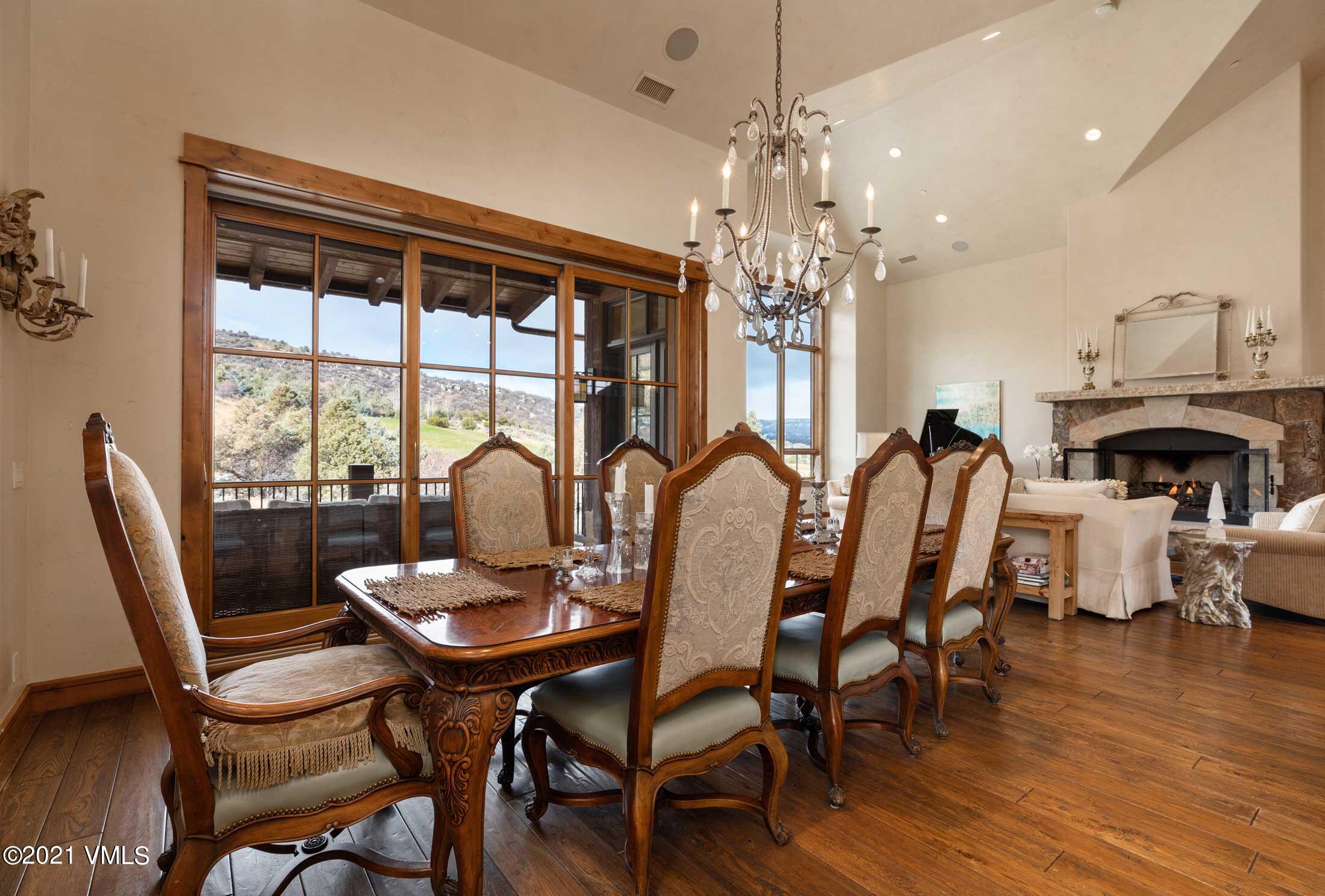 109 Juniper Trail Wolcott, CO 81655 - Photo 3 of 9 a view of a dining room with furniture window and wooden floor