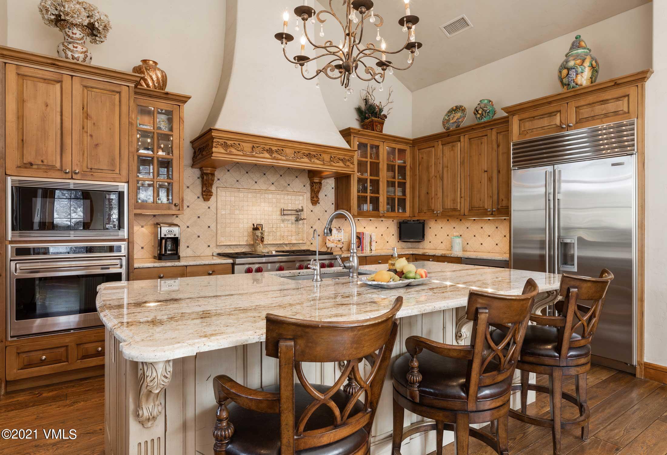 109 Juniper Trail Wolcott, CO 81655 - Photo 4 of 9 a kitchen with a dining table and chairs