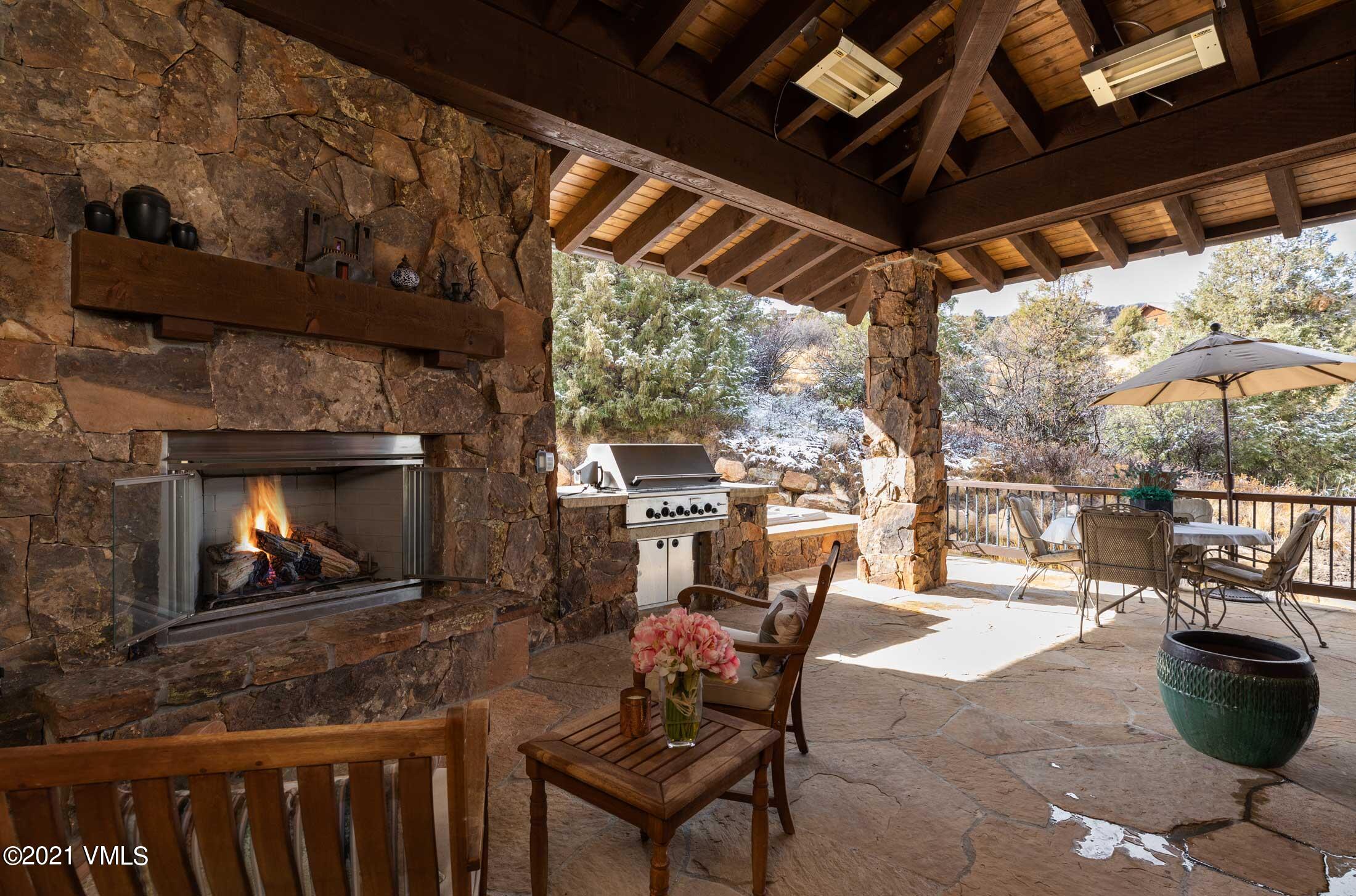 109 Juniper Trail Wolcott, CO 81655 - Photo 5 of 9 a outdoor space with chairs and a fireplace