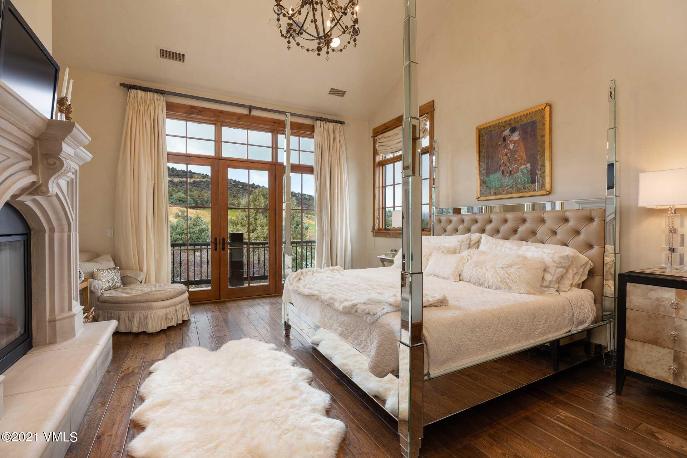 109 Juniper Trail Wolcott, CO 81655 - Photo 6 of 9 a bed room with a bed and a large window