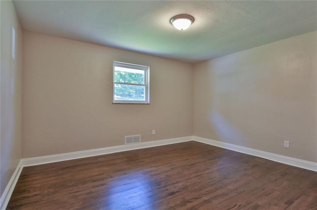 938 Bebout Road Venetia, PA 15367 - Photo 12 of 20 Bedroom 1 with refinished hardwood floors and natural lighting