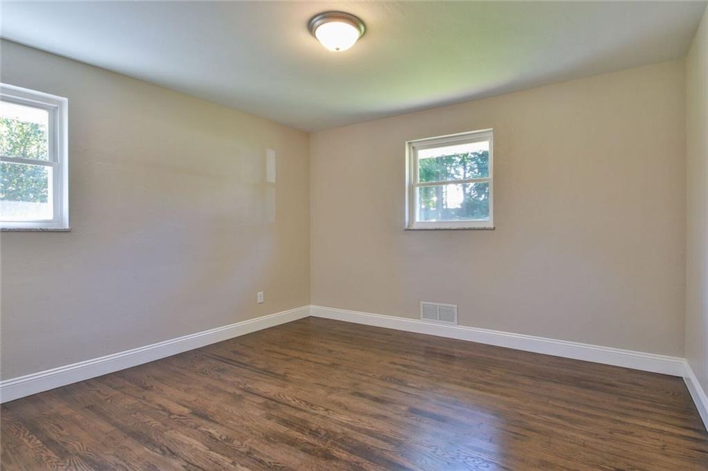 938 Bebout Road Venetia, PA 15367 - Photo 13 of 20 Bedroom 2 with refinished hardwood floors and natural lighting