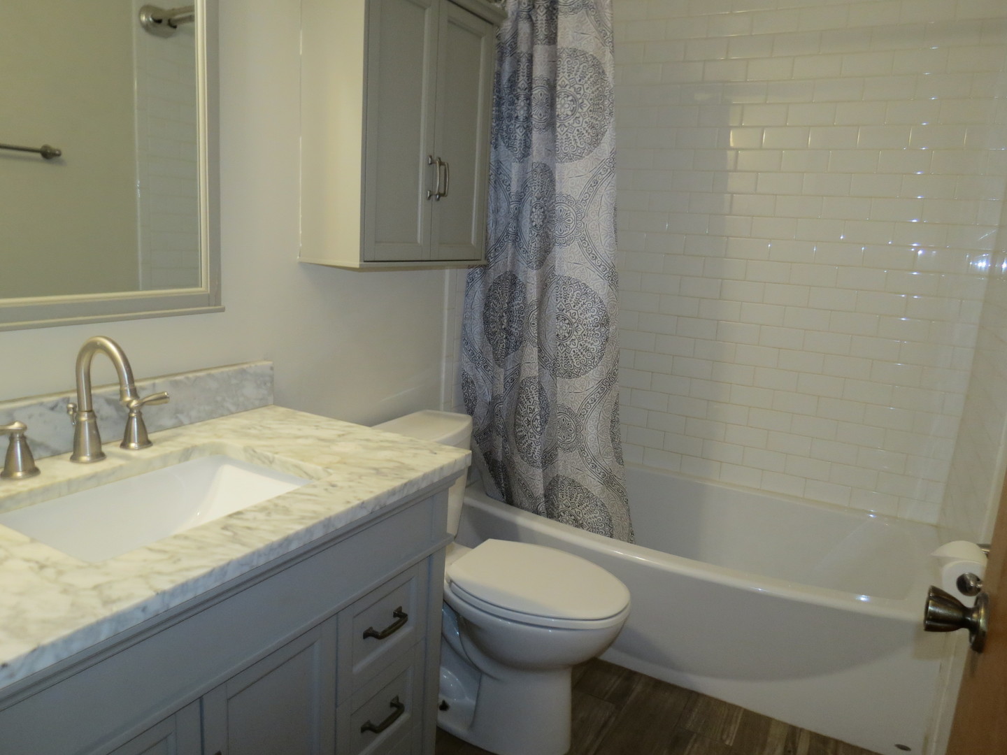 274 East 34th Street Steger, IL 60475 - Photo 20 of 26 a bathroom with a granite countertop sink toilet and shower