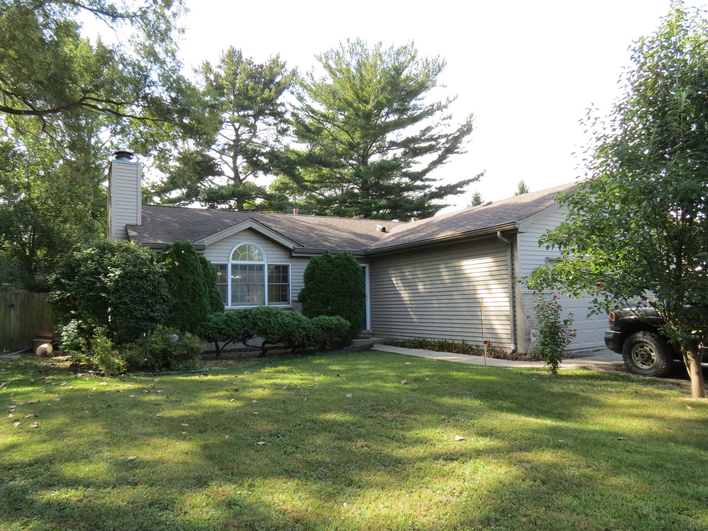 274 East 34th Street Steger, IL 60475 - Photo 2 of 26 a front view of house with yard and trees