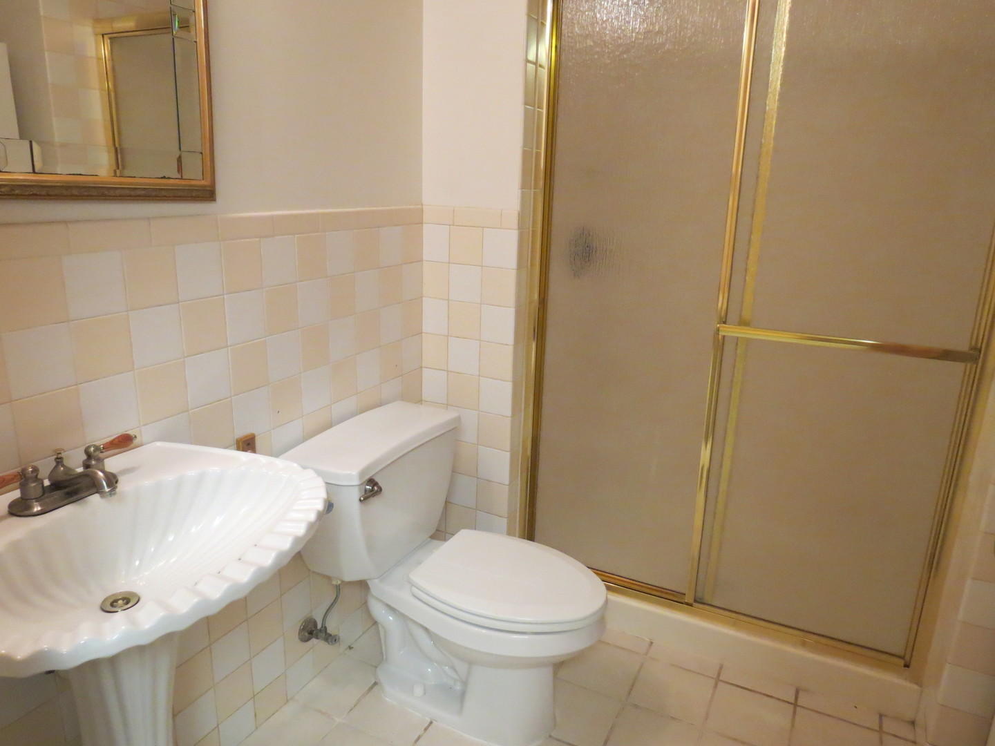 274 East 34th Street Steger, IL 60475 - Photo 24 of 26 a bathroom with a sink and a toilet