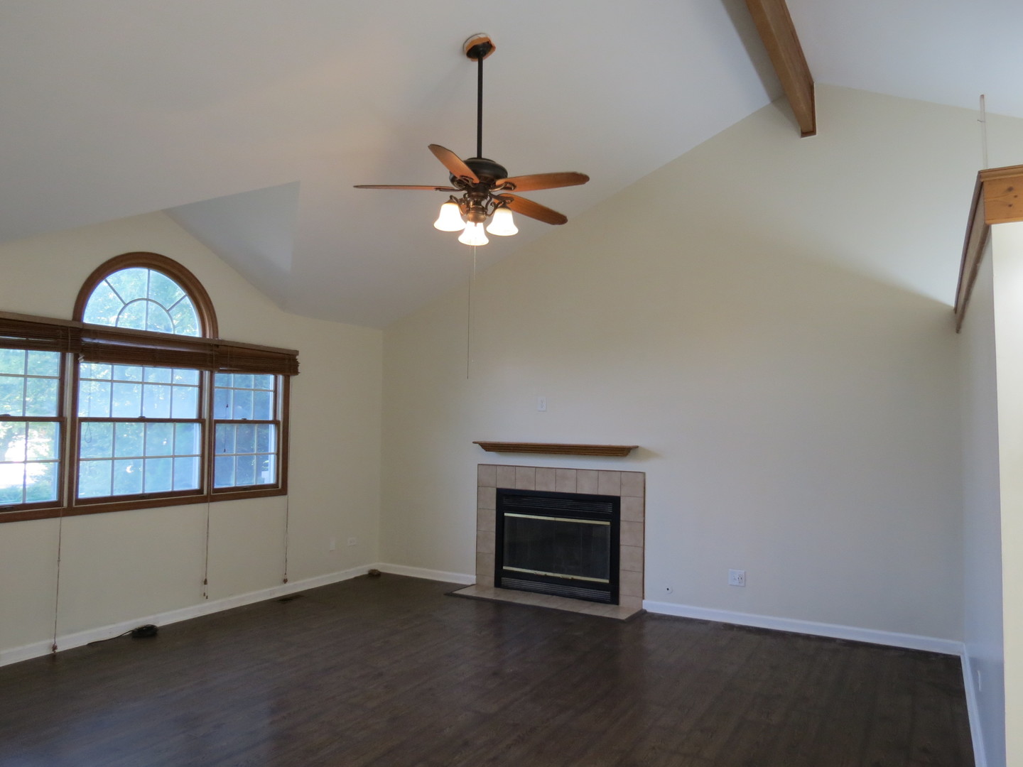 274 East 34th Street Steger, IL 60475 - Photo 5 of 26 an empty room with chandelier fan and windows