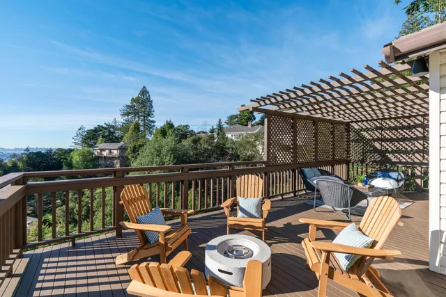a view of a balcony with chairs
