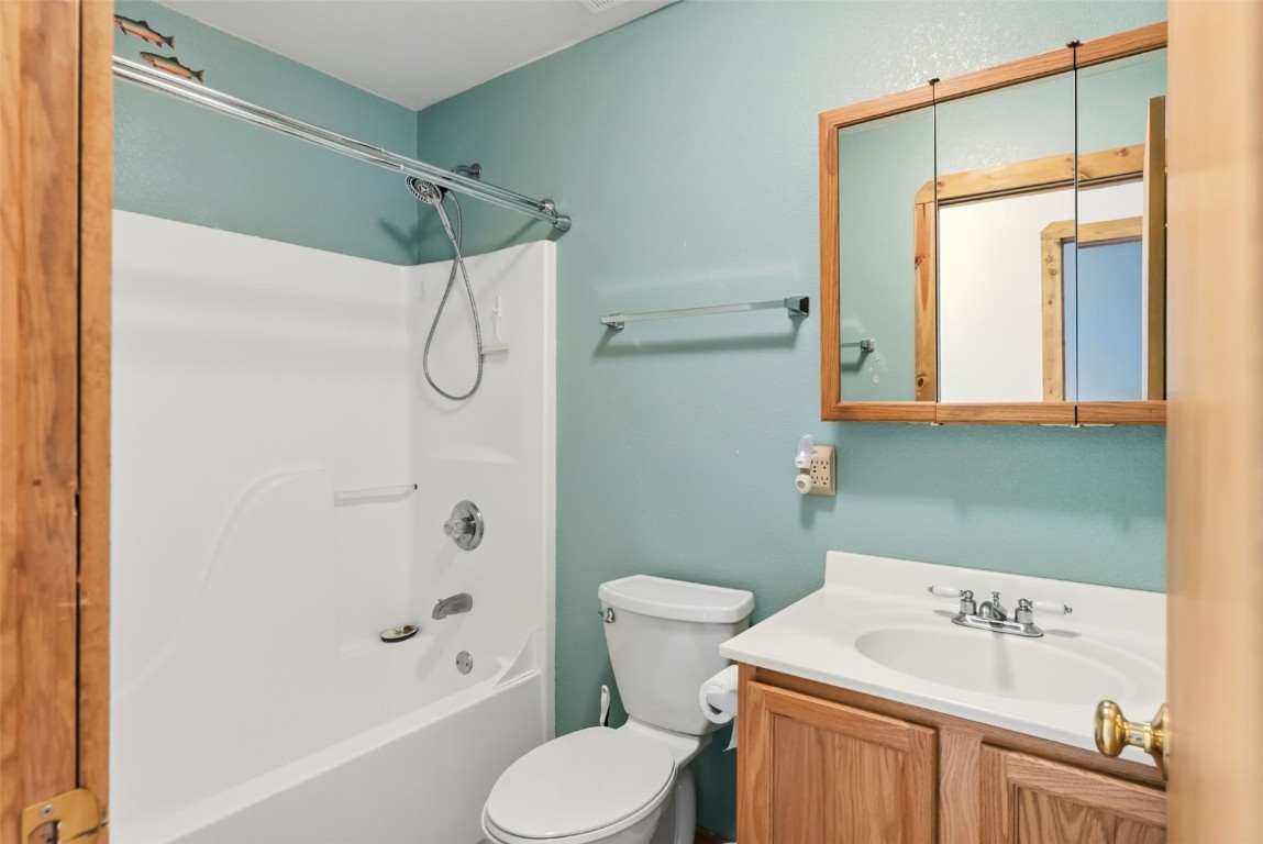 316 3rd Street Fairplay, CO 80440 - Photo 12 of 37 a bathroom with a sink toilet and shower