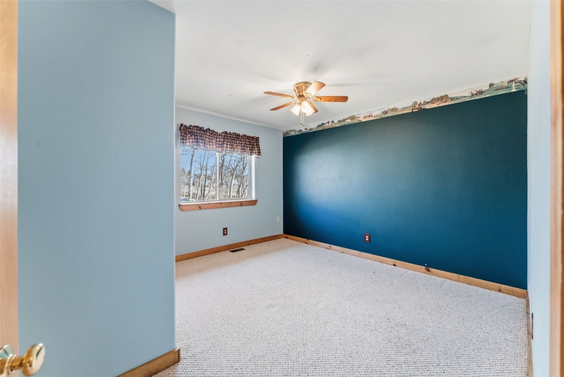 316 3rd Street Fairplay, CO 80440 - Photo 13 of 37 an empty room with windows and cabinet