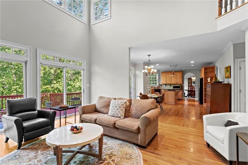 1169 Dawn View Lane Northwest Atlanta, GA 30327 - Photo 19 of 61 a living room with furniture and a large window