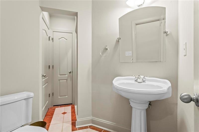 1169 Dawn View Lane Northwest Atlanta, GA 30327 - Photo 37 of 61 a bathroom with a sink toilet and shower