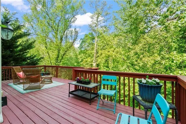 aerial view of a chairs and table in the roof deck
