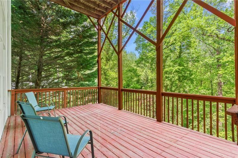 1169 Dawn View Lane Northwest Atlanta, GA 30327 - Photo 49 of 61 a view of balcony with furniture and wooden deck