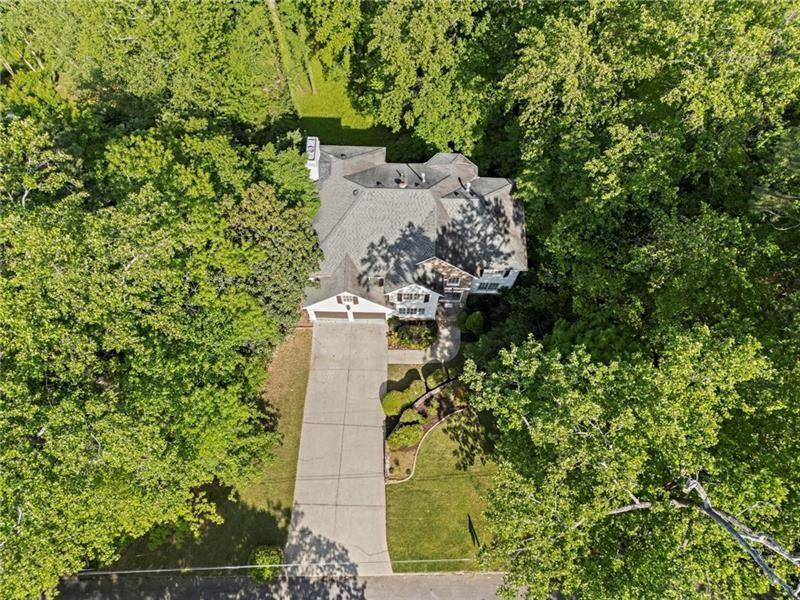 1169 Dawn View Lane Northwest Atlanta, GA 30327 - Photo 56 of 61 an aerial view of a house with a yard